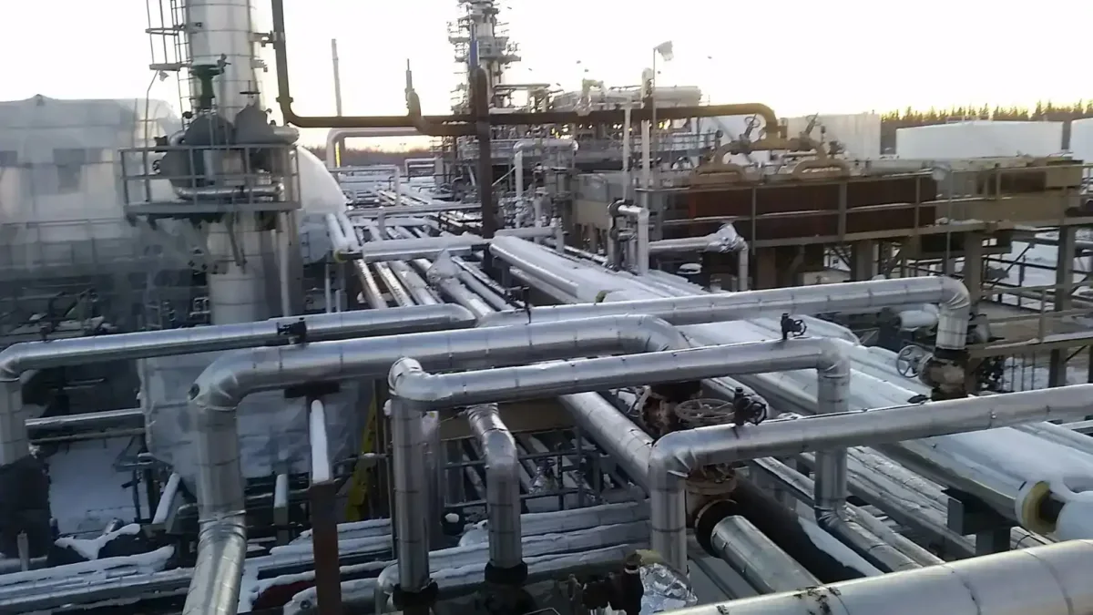 Hire piping estimating services: insulated pipe racks and process piping at an industrial plant